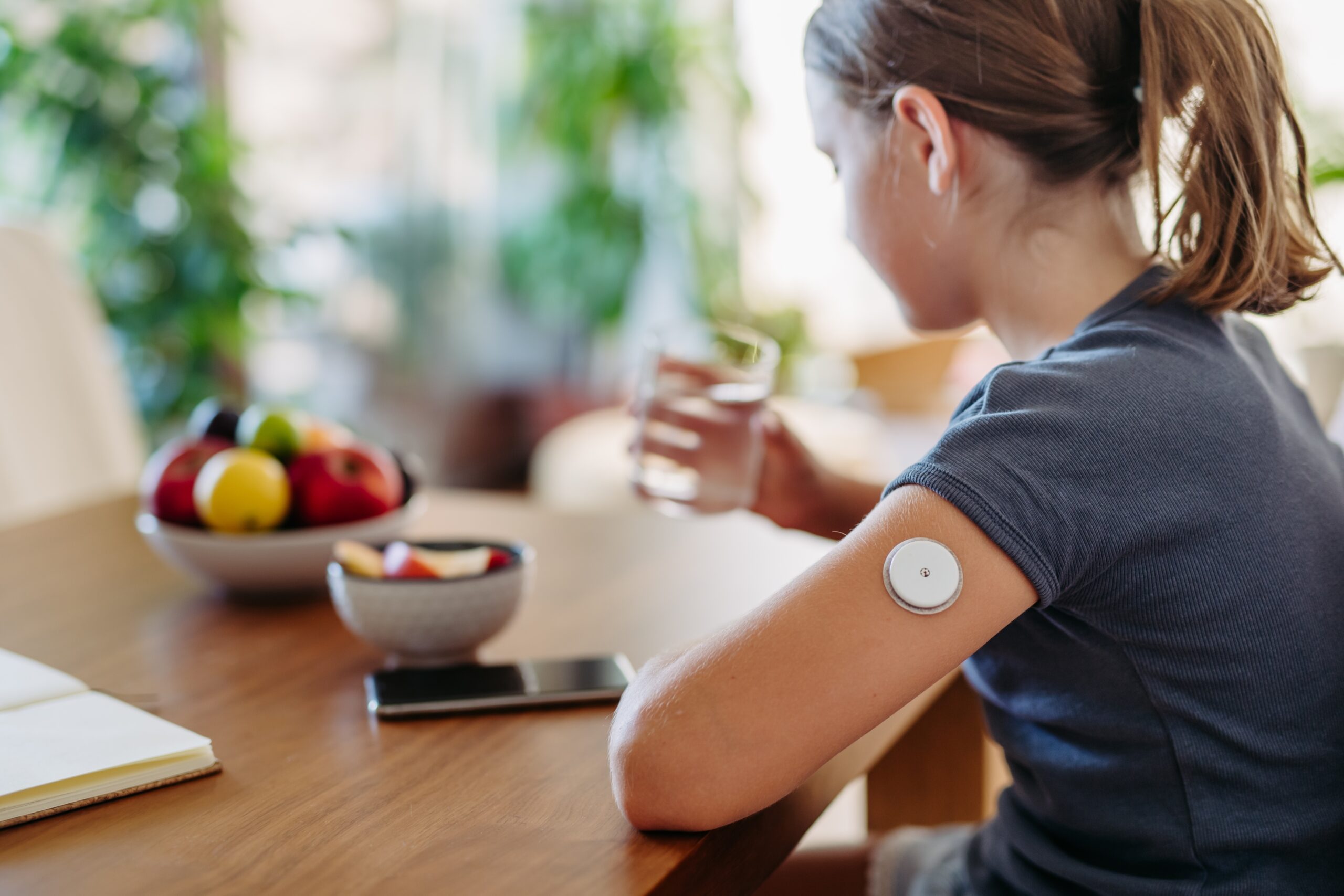 Close,Up,Of,Continuous,Glucose,Monitor,Sensor,On,Girl's,Arm.